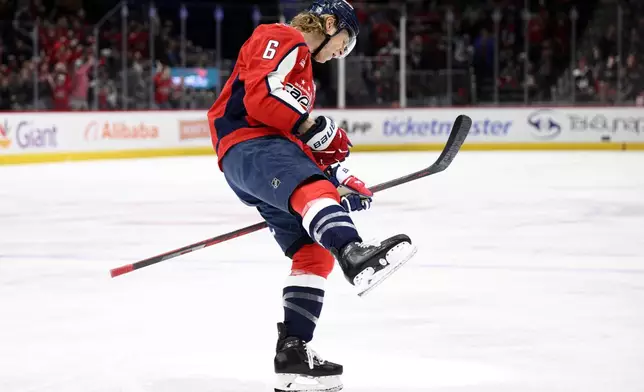 Washington Capitals defenseman Jakob Chychrun celebrates after his goal during the first period of an NHL hockey game against the Montreal Canadiens, Friday, Jan. 10, 2025, in Washington. (AP Photo/Nick Wass)
