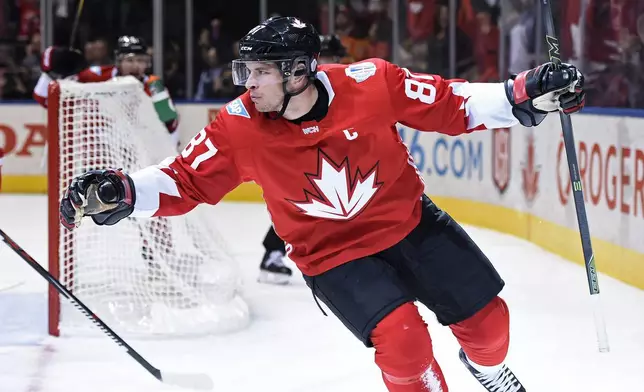 FILE -Team Canada's Sidney Crosby celebrates after scoring against Team Russia during the first period of a World Cup of Hockey semifinal game, Saturday, Sept. 24, 2016 in Toronto. (Nathan Denette/The Canadian Press via AP, File)