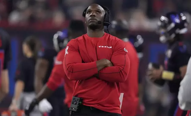 Houston Texans head coach DeMeco Ryans watches from the sideline during the second half of an NFL football game against the Baltimore Ravens, Wednesday, Dec. 25, 2024, in Houston. (AP Photo/Eric Christian Smith)