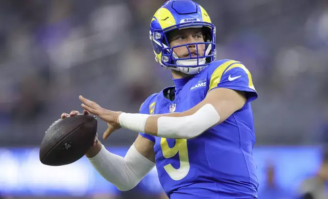 Los Angeles Rams quarterback Matthew Stafford warms up before an NFL football game against the Arizona Cardinals, Saturday, Dec. 28, 2024, in Inglewood, Calif. (AP Photo/Ryan Sun)