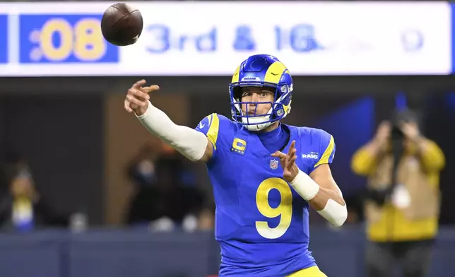 Los Angeles Rams quarterback Matthew Stafford (9) throw a pass during the first half of an NFL football game against the Arizona Cardinals, Saturday, Dec. 28, 2024, in Inglewood, Calif. (AP Photo/Alex Gallardo)