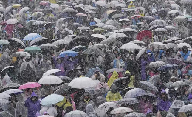 Supporters of impeached South Korean President Yoon Suk Yeol attend a Sunday service as they gather to oppose his impeachment near the presidential residence in Seoul, South Korea, Sunday, Jan. 5, 2025. (AP Photo/Ahn Young-joon)