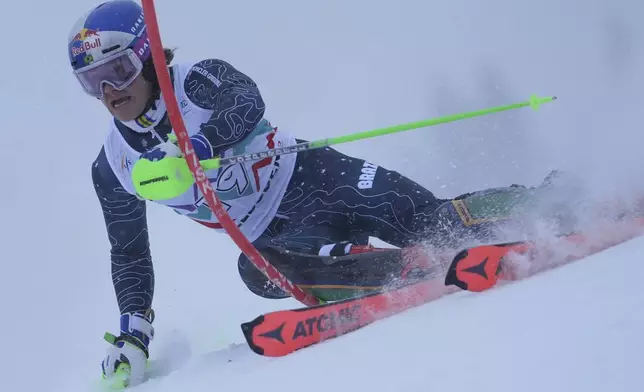 Brazil' Lucas Braathen speeds down the course during an alpine ski, men's World Cup slalom race, in Adelboden, Switzerland, Saturday, Jan. 11, 2025. (AP Photo/Giovanni Zenoni)