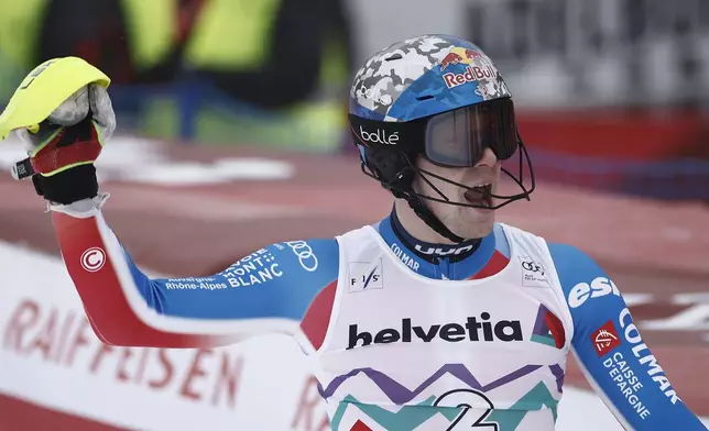 France's Clement Noel reacts after winning an alpine ski, men's World Cup slalom race, in Adelboden, Switzerland, Saturday, Jan. 11, 2025. (AP Photo/Gabriele Facciotti)