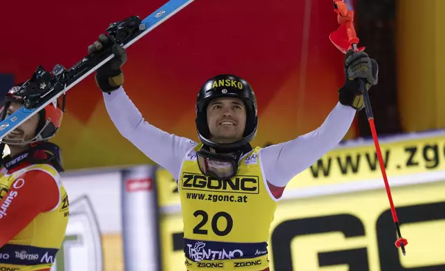 Bulgaria's Albert Popov celebrates winning an alpine ski, men's World Cup slalom in Madonna di Campiglio, Italy, Wednesday, Jan.8, 2025. (AP Photo/Alessandro Trovati)