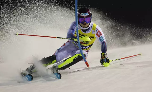 Norway's Atle Lie McGrath speeds down the course during an alpine ski, men's World Cup slalom in Madonna di Campiglio, Italy, Wednesday, Jan.8, 2025. (AP Photo/Alessandro Trovati