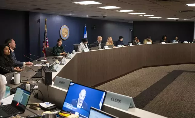 The Minneapolis City Council votes to go into closed session immediately after gaveling into session to go over a federal consent decree mandating reforms to the police department in Minneapolis, Monday, Jan. 6, 2025. (Leila Navidi/Star Tribune via AP)