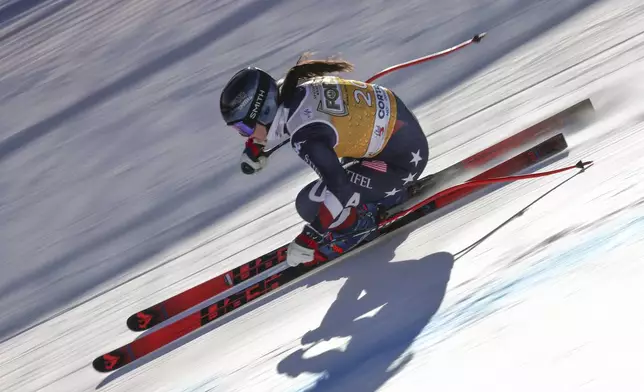 United States' Jacqueline Wiles speeds down the course during an alpine ski, women's World Cup downhill training, in Cortina d'Ampezzo, Italy, Friday, Jan. 17, 2025. (AP Photo/Marco Trovati)