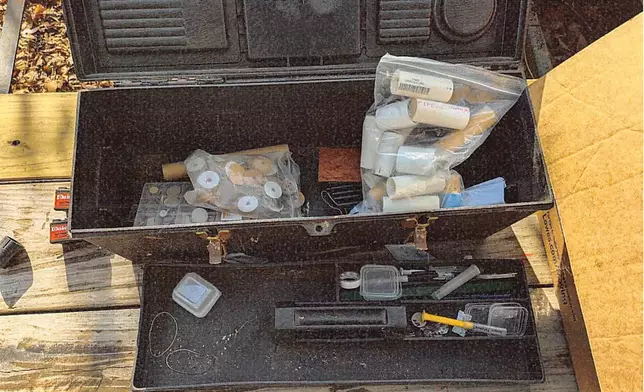 This image provided by U.S. Attorney’s Office, Eastern District of Virginia shows a stockpile of homemade explosives Federal agents seized when they arrested Brad Spafford, a Virginia man on a firearms charge in Dec. 2024. (U.S. Attorney’s Office, Eastern District of Virginia via AP)