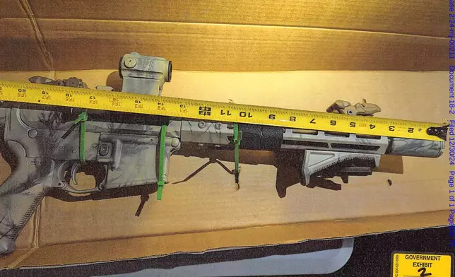 This image provided by U.S. Attorney’s Office, Eastern District of Virginia shows a rifle seized when they arrested Brad Spafford, a Virginia man on a firearms charge in Dec. 2024. (U.S. Attorney’s Office, Eastern District of Virginia via AP)