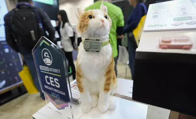 A GlocalMe KeyTracker for Pet is displayed on a stuffed animal at a GlocalMe booth during the CES tech show Wednesday, Jan. 8, 2025, in Las Vegas. (AP Photo/Abbie Parr)