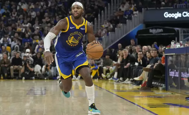 FILE - Golden State Warriors guard Buddy Hield controls the ball during an NBA basketball game against the New Orleans Pelicans in San Francisco, Oct. 30, 2024. (AP Photo/Jeff Chiu, File)