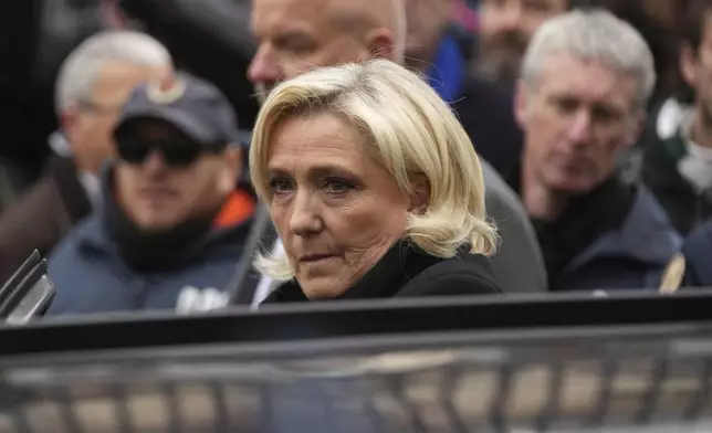 French far-right leader Marine Le Pen arrives Notre Dame du Val-de-Grace church for a public memorial for her father and late far-right leader Jean-Marie Le Pen, Thursday, Jan. 16, 2025 in Paris. Jean-Marie Le Pen, the founder of France's main far-right party, died on Jan.7, 2025 aged 96. (AP Photo/Thibault Camus)