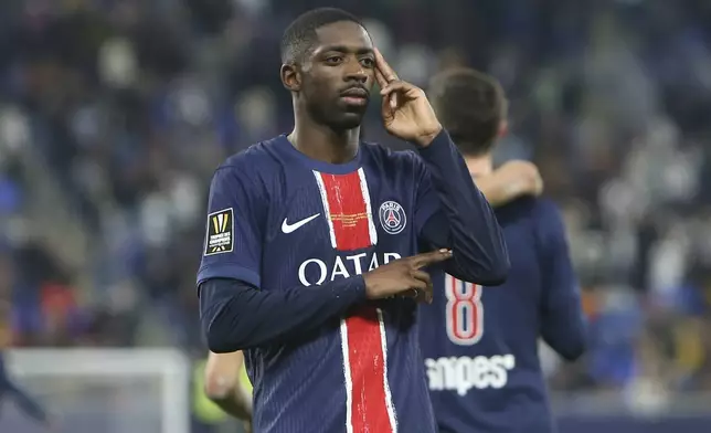 PSG's Ousmane Dembele celebrates after he scored during the French Super Cup final match between Paris Saint Germain and Monaco in Doha, Qatar, on Sunday, Jan. 5, 2025.(AP Photo/Hussein Sayed)