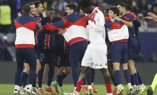 PSG players celebrate after the French Super Cup final match between Paris Saint Germain and Monaco in Doha, Qatar, on Sunday, Jan. 5, 2025.(AP Photo/Hussein Sayed)