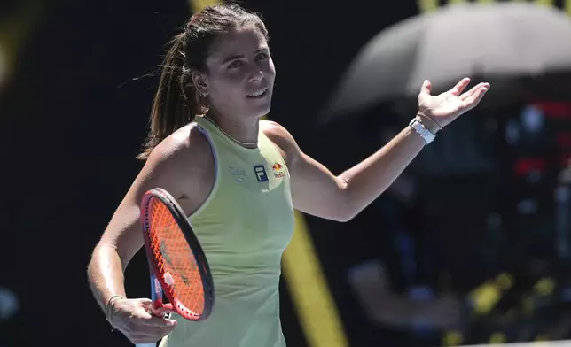 Emma Navarro of the U.S. reacts after defeating Peyton Stearns in their first round match at the Australian Open tennis championship in Melbourne, Australia, Tuesday, Jan. 14, 2025. (AP Photo/Ng Han Guan)