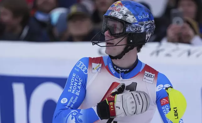 France's Clement Noel reacts after completing an alpine ski, men's World Cup slalom in Kitzbühel, Austria, Sunday, Jan. 26, 2025. (AP Photo/Giovanni Auletta)