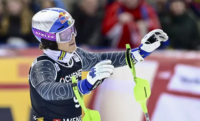Brazil's Lucas Pinheiro Braathen reacts at the finish area of an alpine ski, men's World Cup slalom, in Wengen, Switzerland, Sunday, Jan. 19, 2025.(Jean-Christophe Bott/Keystone via AP)