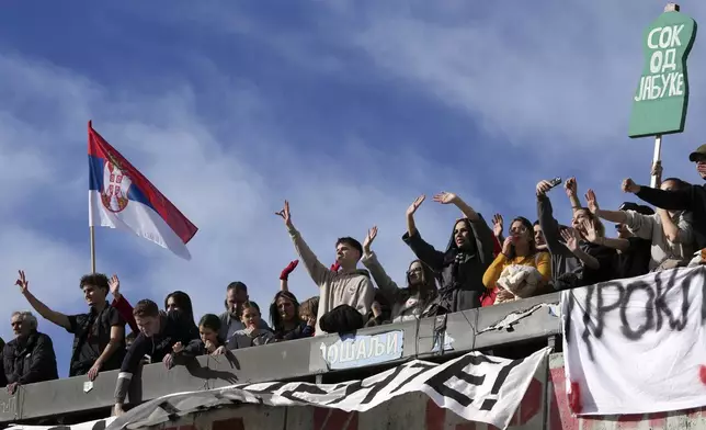 Students during a student-led 24 hour block on an intersection to protest the deaths of 15 people killed in the November collapse of a train station canopy, in Belgrade, Serbia, Monday, Jan. 27, 2025. (AP Photo/Darko Vojinovic)