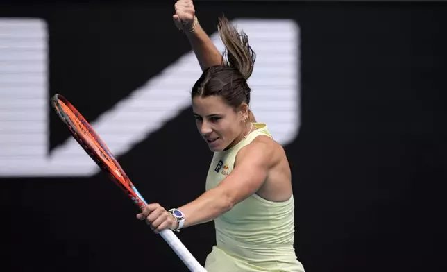 Emma Navarro of the U.S. celebrates after defeating Wang Xiyu of China during their second round match at the Australian Open tennis championship in Melbourne, Australia, Thursday, Jan. 16, 2025. (AP Photo/Ng Han Guan)