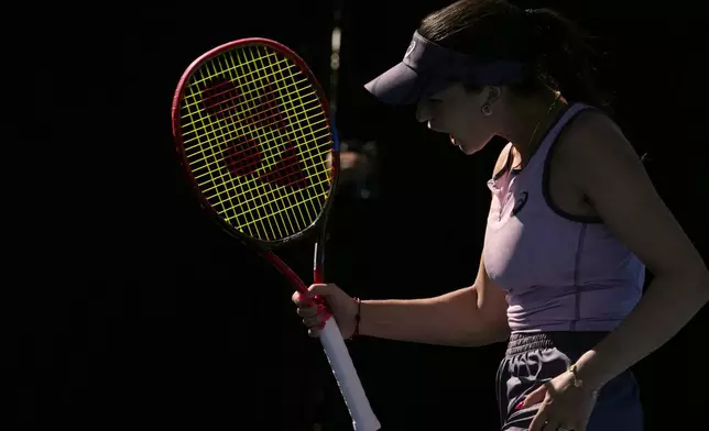 Eva Lys of Germany reacts after winning a point against Varvara Gracheva of France during their second round match at the Australian Open tennis championship in Melbourne, Australia, Thursday, Jan. 16, 2025. (AP Photo/Manish Swarup)
