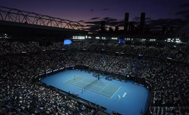Jannik Sinner of Italy and Tristan Schoolkate of Australia play their second round match on Rod Laver Arena at the Australian Open tennis championship in Melbourne, Australia, Thursday, Jan. 16, 2025. (AP Photo/Asanka Brendon Ratnayake)