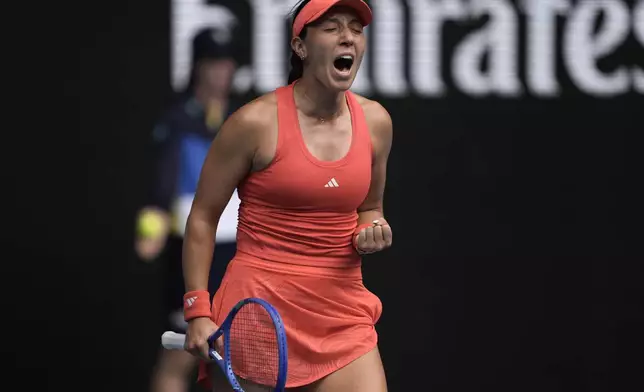 Jessica Pegula of the U.S. celebrates after defeating Elise Mertens of Belgium in their second round match at the Australian Open tennis championship in Melbourne, Australia, Wednesday, Jan. 15, 2025. (AP Photo/Ng Han Guan)
