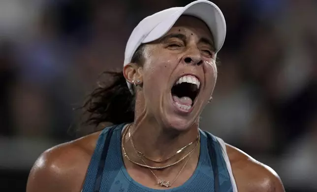 Madison Keys of the U.S. reacts after winning a point against Elena-Gabriela Ruse of Romania during their second round match at the Australian Open tennis championship in Melbourne, Australia, Thursday, Jan. 16, 2025. (AP Photo/Ng Han Guan)