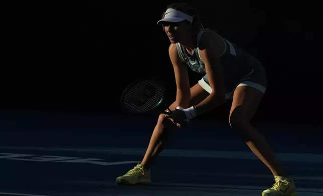 Katie Boulter of Britain waits to receive serve from Veronika Kudermetova of Russia during their second round match at the Australian Open tennis championship in Melbourne, Australia, Thursday, Jan. 16, 2025. (AP Photo/Manish Swarup)