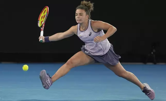 Jasmine Paolini of Italy plays a forehand return to Renata Zarazua of Mexico during their second round match at the Australian Open tennis championship in Melbourne, Australia, Thursday, Jan. 16, 2025. (AP Photo/Asanka Brendon Ratnayake)
