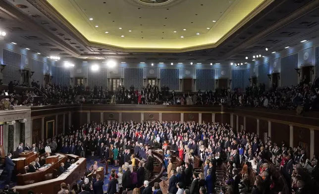 Members of the House take the oath of office as the House of Representatives meets to elect a speaker and convene the new 119th Congress at the Capitol in Washington, Friday, Jan. 3, 2025. (AP Photo/Mark Schiefelbein)