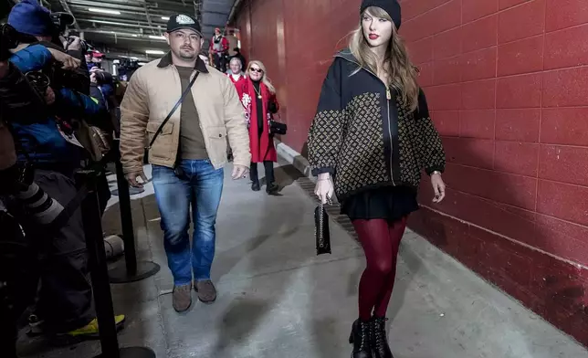 Taylor Swift arrives to Arrowhead Stadium before the AFC Championship NFL football game against the Buffalo Bills, Sunday, Jan. 26, 2025, in Kansas City, Mo. (AP Photo/Ashley Landis)