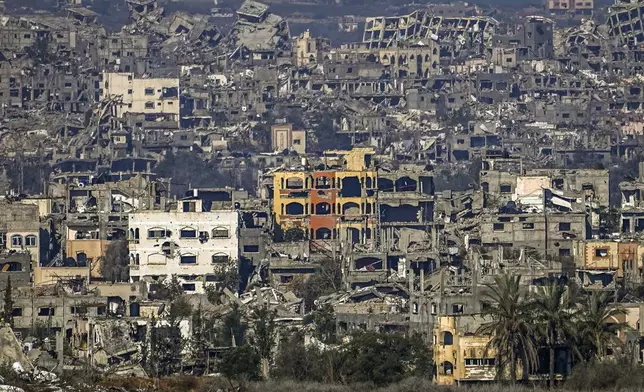 A destroyed part of Gaza City as seen from southern Israel, Thursday Jan. 2, 2025. (AP Photo/Tsafrir Abayov))