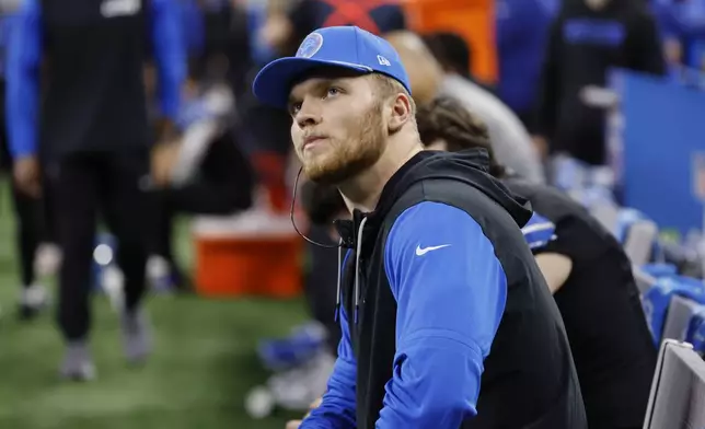 Detroit Lions' Aidan Hutchinson is seen on the sideline during the first half of an NFL football game against the Minnesota Vikings, Sunday, Jan. 5, 2025, in Detroit. (AP Photo/Rey Del Rio)