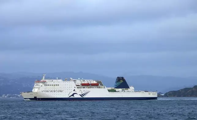 An Interislander ferry arrives in Wellington harbor, New Zealand, on Tuesday, Jan. 7, 2025. (AP Photo/Charlotte Graham-McLay)