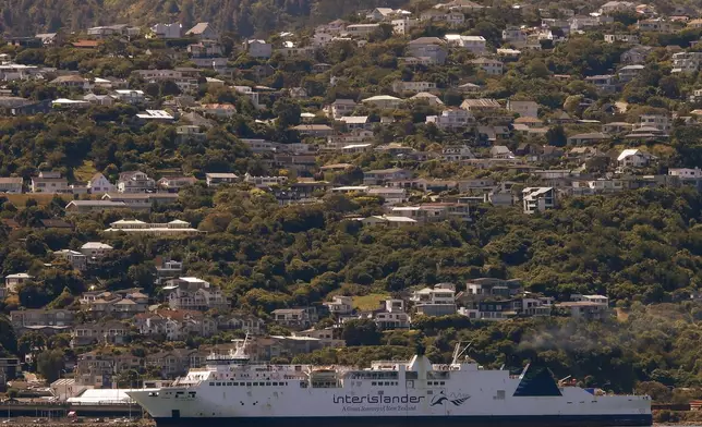 An Interislander ferry leaves Wellington harbor, New Zealand, on Tuesday, Jan. 7, 2025. (AP Photo/Charlotte Graham-McLay)