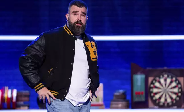 Former NFL player and ESPN analyst Jason Kelce performs his opening monologue during the taping of "They Call It Late Night with Jason Kelce", Friday, Jan. 3, 2025, in Philadelphia. (AP Photo/Chris Szagola)