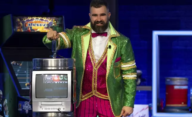 Former NFL player and ESPN analyst Jason Kelce introduces the final segment during the taping of "They Call It Late Night with Jason Kelce", Friday, Jan. 3, 2025, in Philadelphia. (AP Photo/Chris Szagola)