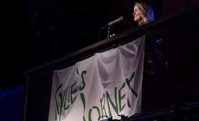 Kylie Kelce gives the thumbs up from "Kylie's Corner" during the taping of "They Call It Late Night with Jason Kelce", Friday, Jan. 3, 2025, in Philadelphia. (AP Photo/Chris Szagola)