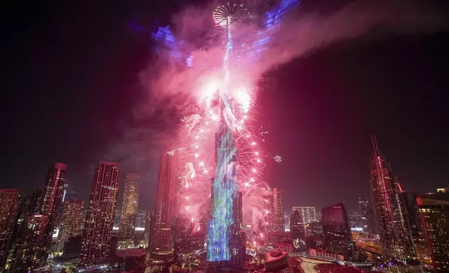 Fireworks explode at the Burj Khalifa, the world's tallest building, during the New Year's Eve celebration in Dubai, United Arab Emirates, Wednesday, Jan. 1, 2025. (AP Photo/Altaf Qadri)