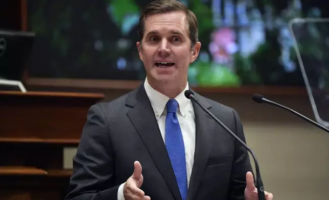 Kentucky Governor Andy Beshear gives his State of The Commonwealth address in the House chamber at the Kentucky State Capitol in Frankfort, Ky., Wednesday, Jan. 8, 2025. (AP Photo/Timothy D. Easley)