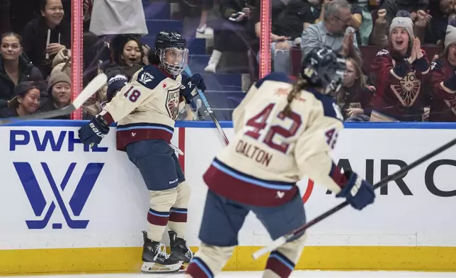 Montreal Victoire's Mikyla Grant-Mentis (18) celebrates her goal against the Toronto Sceptres during first period PWHL hockey action in Vancouver, on Wednesday, January 8, 2025. (Ethan Cairns/The Canadian Press via AP)