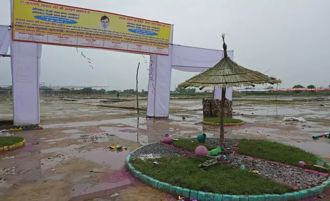 FILE - Rain puddles are seen at the scene of a fatal stampede, in Fulrai village of Hathras district about 350 kilometers (220 miles) southwest of the state capital Lucknow, India, on July 3, 2024. (AP Photo/Rajesh Kumar Singh, File)