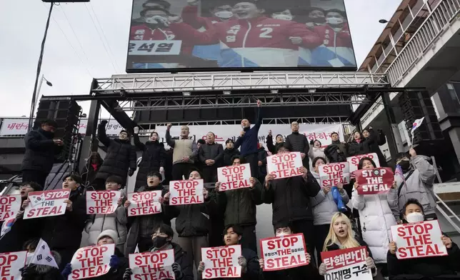 Supporters of impeached South Korean President Yoon Suk Yeol shout slogans during a rally to oppose his impeachment near the presidential residence in Seoul, South Korea, Wednesday, Jan. 8, 2025. (AP Photo/Ahn Young-joon)