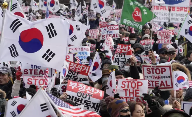 Supporters of impeached South Korean President Yoon Suk Yeol attend a rally to oppose his impeachment near the presidential residence in Seoul, South Korea, Wednesday, Jan. 8, 2025. (AP Photo/Ahn Young-joon)