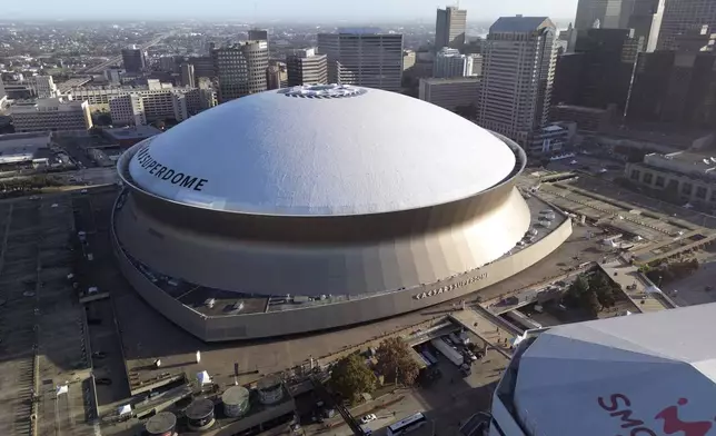 An aerial overall exterior general view of Caesars Superdome, Sunday, Dec. 15, 2024, in New Orleans. (AP Photo/Tyler Kaufman)