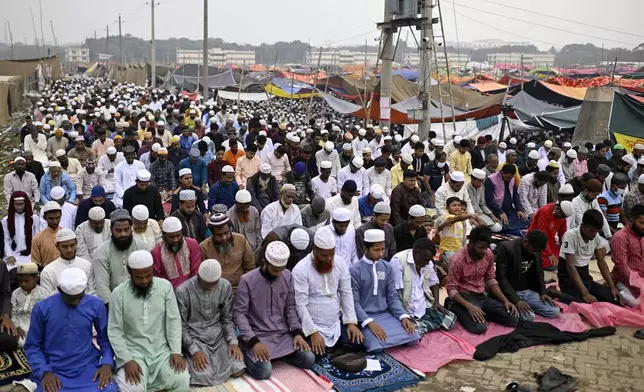 Muslim devotees pray during the first phase of the three-day Biswa Ijtema, or the World Congregation of Muslims, at the banks of the Turag river in Tongi, near Dhaka, Bangladesh, Friday, Jan. 31, 2025. (AP Photo/Mahmud Hossain Opu)