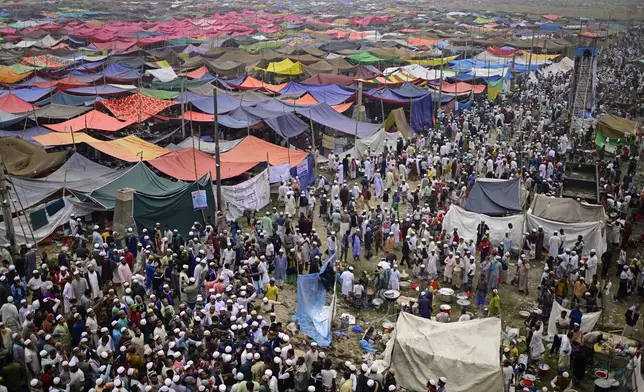 Muslim devotees gather during the first phase of the three-day Biswa Ijtema, or the World Congregation of Muslims, at the banks of the Turag river in Tongi, near Dhaka, Bangladesh, Friday, Jan. 31, 2025. (AP Photo/Mahmud Hossain Opu)