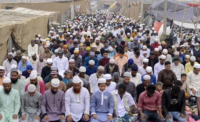 Muslim devotees pray during the first phase of the three-day Biswa Ijtema, or the World Congregation of Muslims, at the banks of the Turag river in Tongi, near Dhaka, Bangladesh, Friday, Jan. 31, 2025. (AP Photo/Mahmud Hossain Opu)