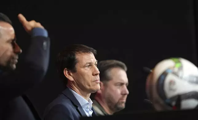 Newly appointed coach for Belgium's national team Red Devils, Rudi Garcia, center, addresses a media conference in Tubize, Belgium, Friday, Jan. 24, 2025. (AP Photo/Virginia Mayo)